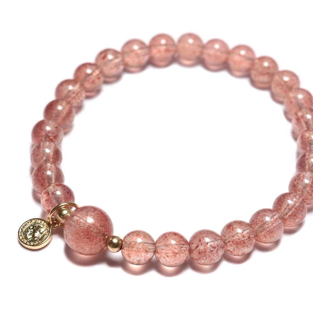 
                  
                    Blossoming Heart - Strawberry Quartz Charm Bracelet
                  
                