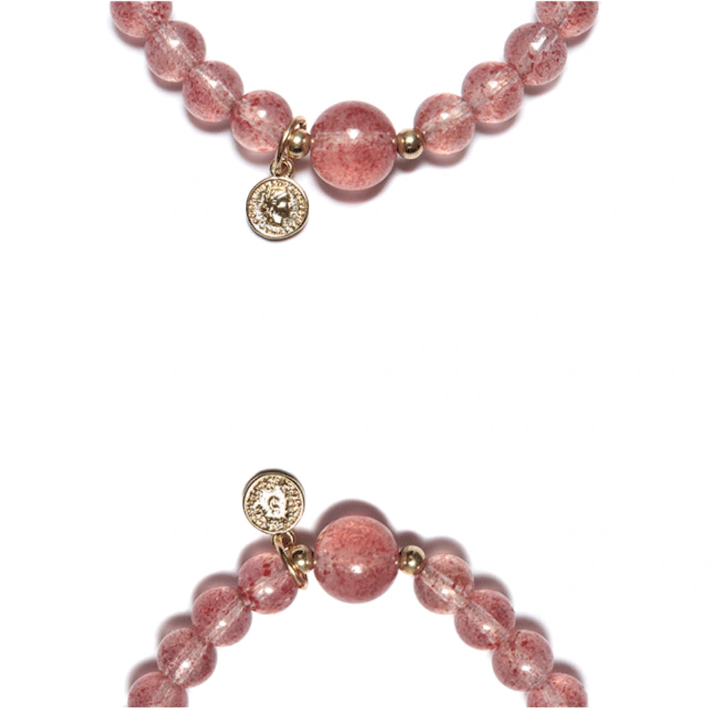 
                  
                    Blossoming Heart - Strawberry Quartz Charm Bracelet
                  
                