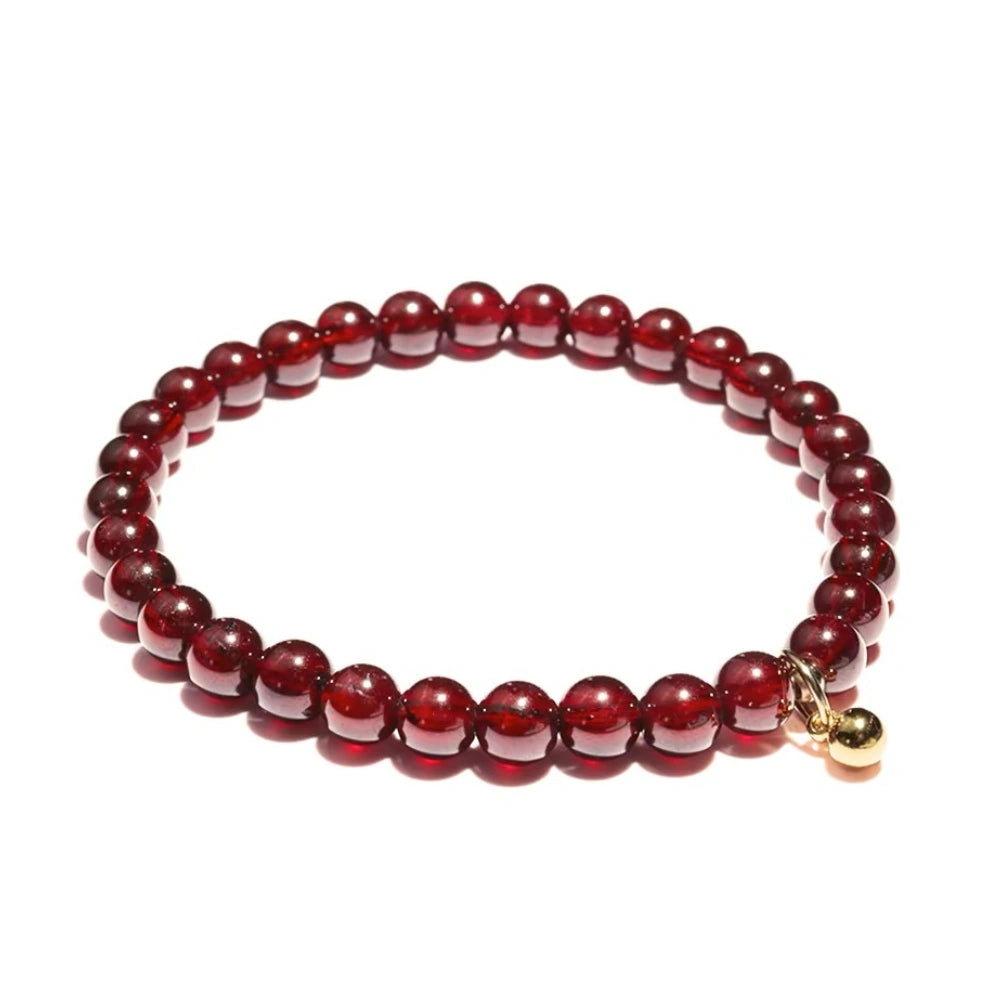 
                  
                    Graceful Bloom - Garnet Charm Bracelet
                  
                