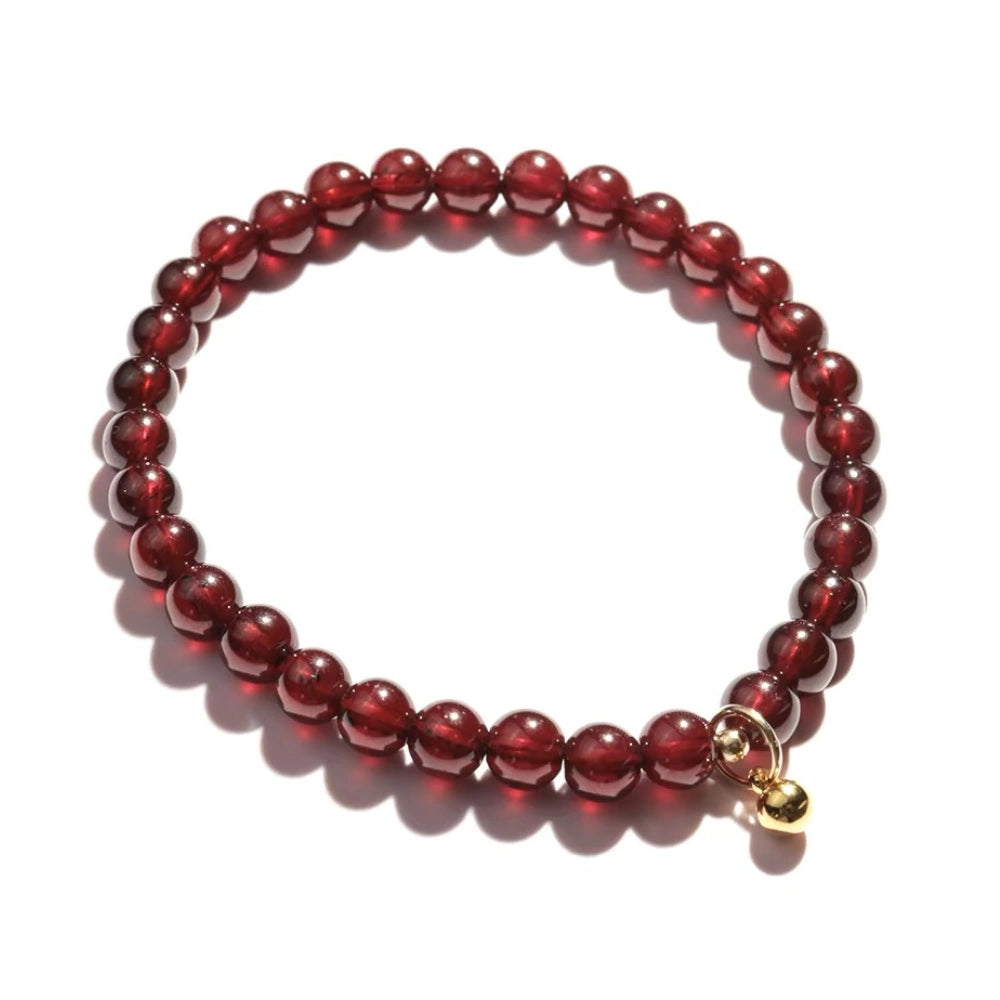 
                  
                    Graceful Bloom - Garnet Charm Bracelet
                  
                