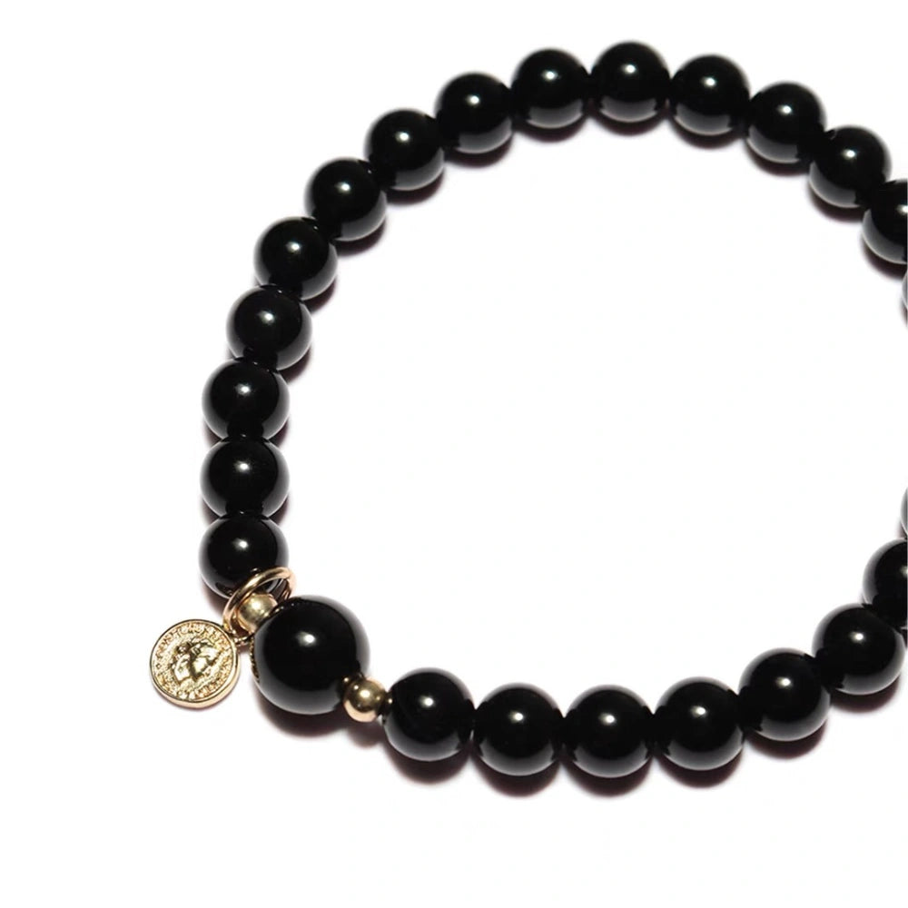 
                  
                    Shadow Shield Obsidian Charm Bracelet
                  
                